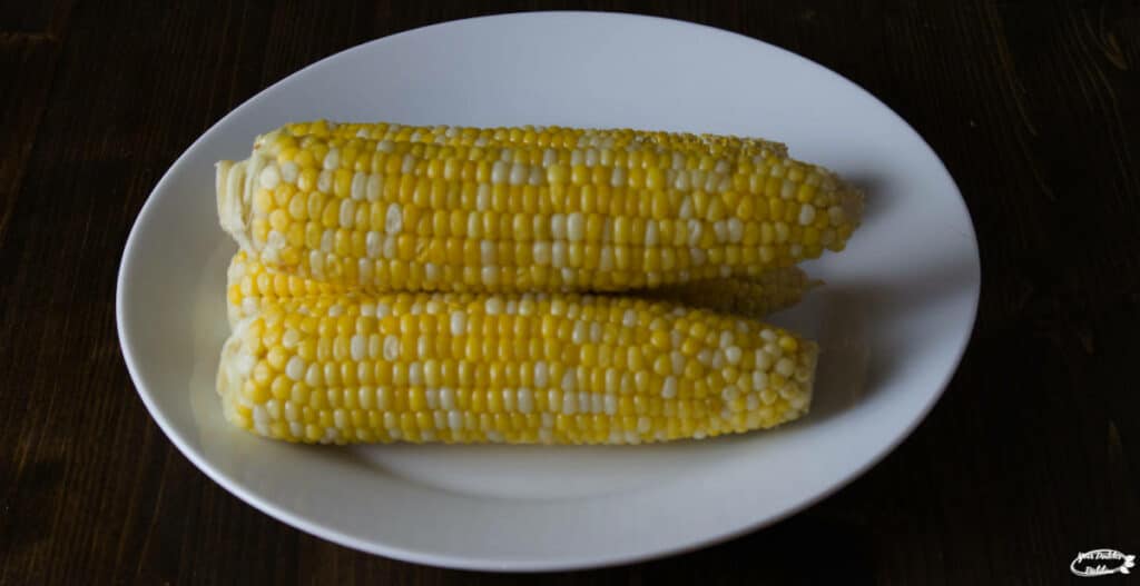 A stack of corn on a plat