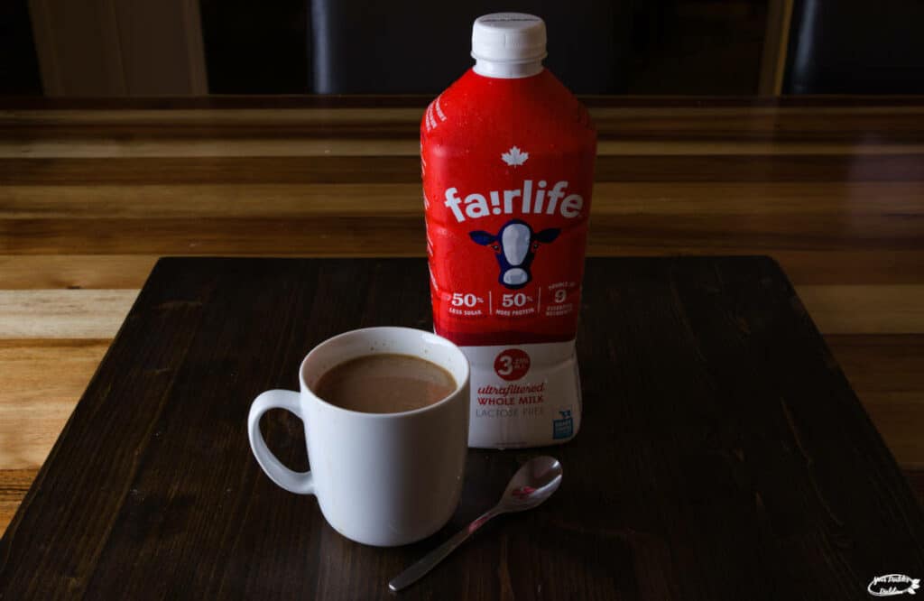 Fairlife milk with a cup of coffee.