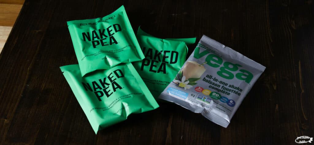 An assorted mix of plant-based protein powder packages.
